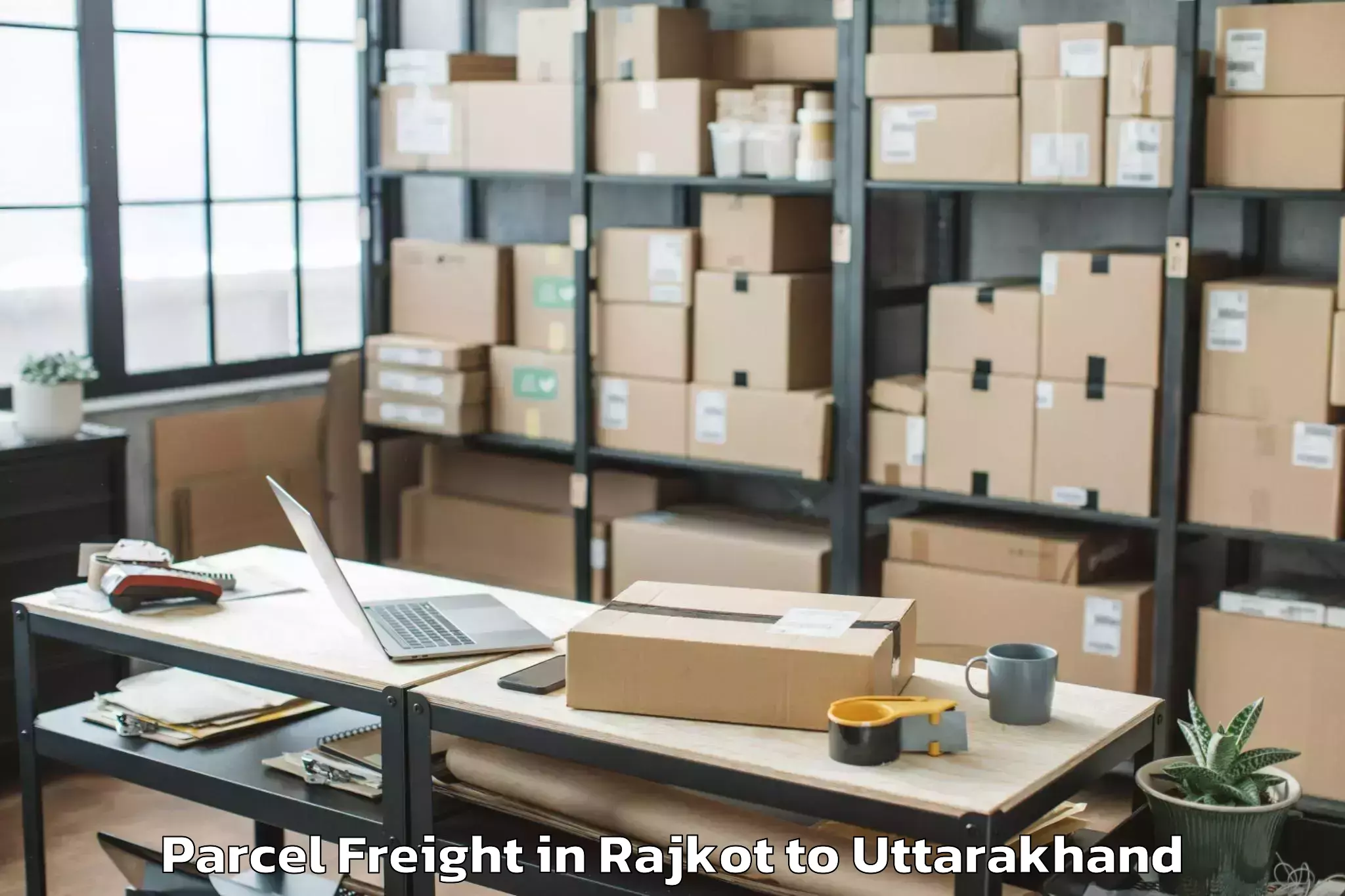 Efficient Rajkot to Dehradun Parcel Freight